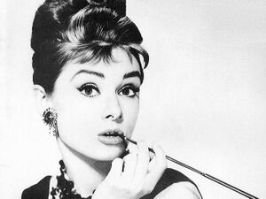 Audrey Hepburn smoking.jpg